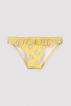 Culetín niña detalle volantes y lazos estampado tortugas amarillo