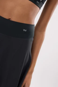 Falda deportiva Compressive con short y bolsillo interior negra