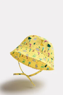 Gorro de playa bebé ala recta estampado dinosaurios amarillo