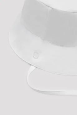 Gorro de playa bebé de algodón blanco ala ondulada