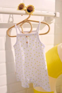 Peto bebé sin mangas estampado limones