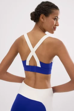 Sujetador deportivo contorno ajustable blanco y azul eléctrico