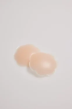 Tapapezones adhesivo