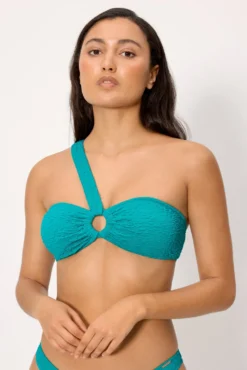 Top bikini asimétrico con textura turquesa copa B