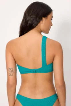 Top bikini asimétrico con textura turquesa copa B