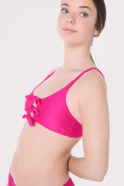 Top bikini juvenil texturizado detalles lazos fucsia